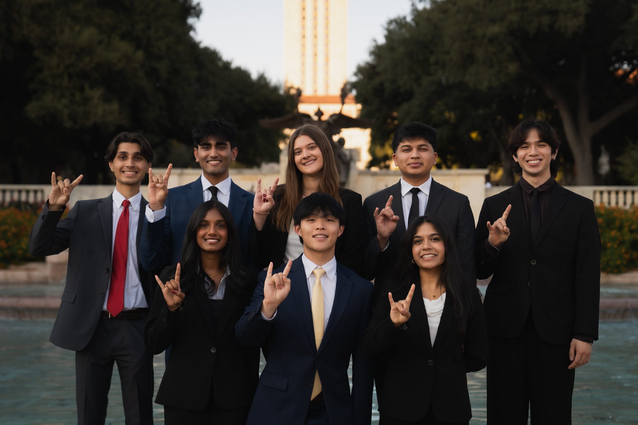 Texas 180 Degrees Consulting members in front of the UT Tower