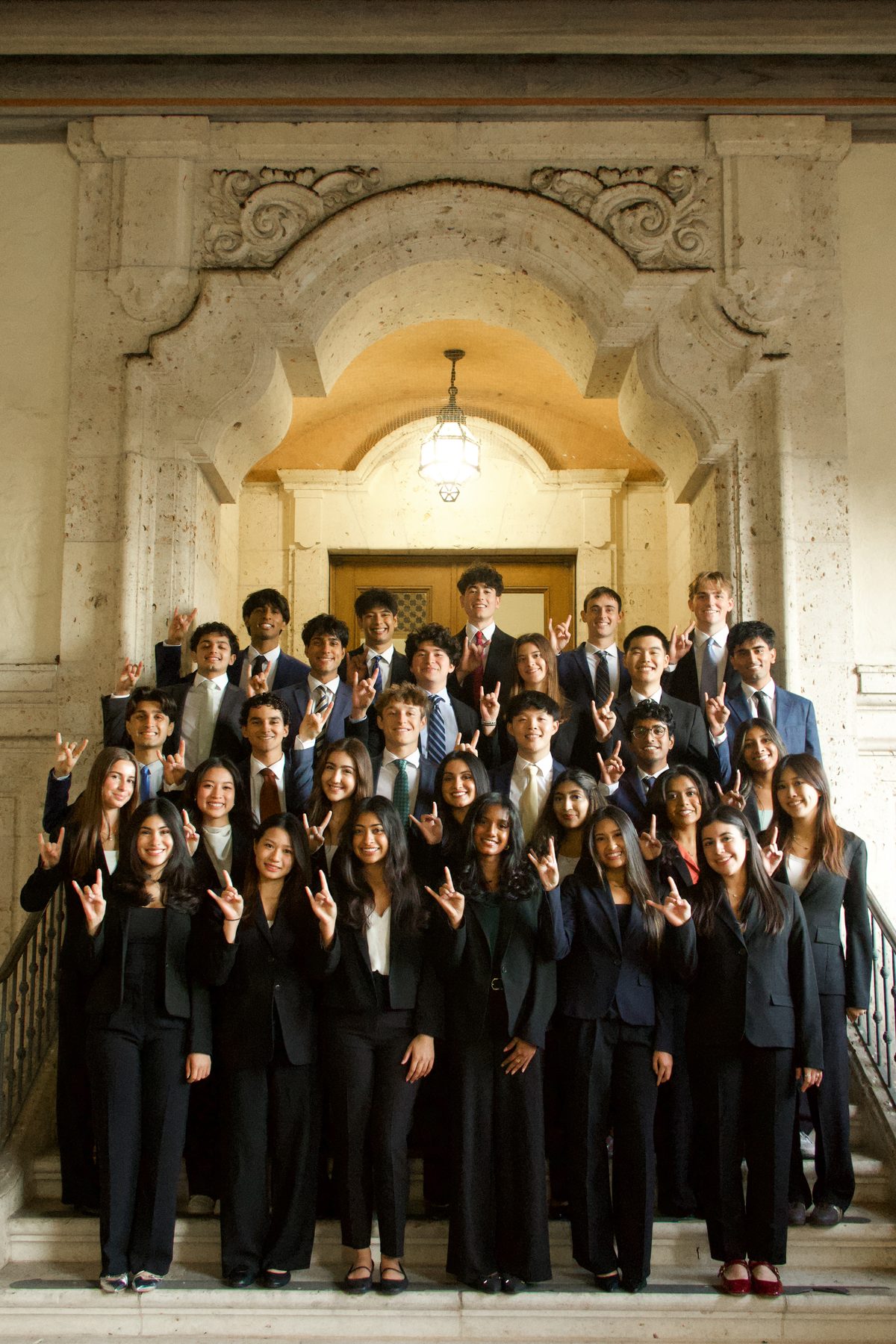 The Texas 180 chapter on the steps of Main Building